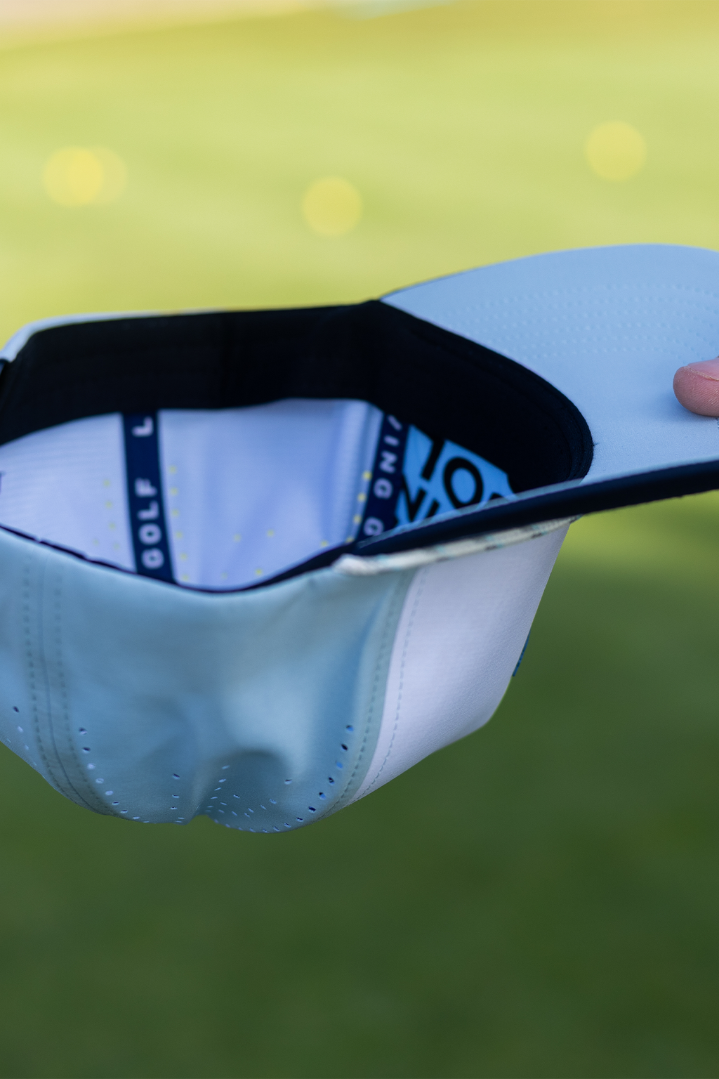 BooYaa Premium Golf Hat, Tee Off White and Navy Snapback Cap, Laser-Cut Vents, Unisex